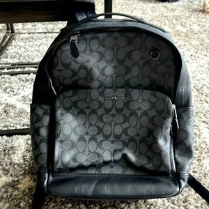 Coach black canvas and leather backpack